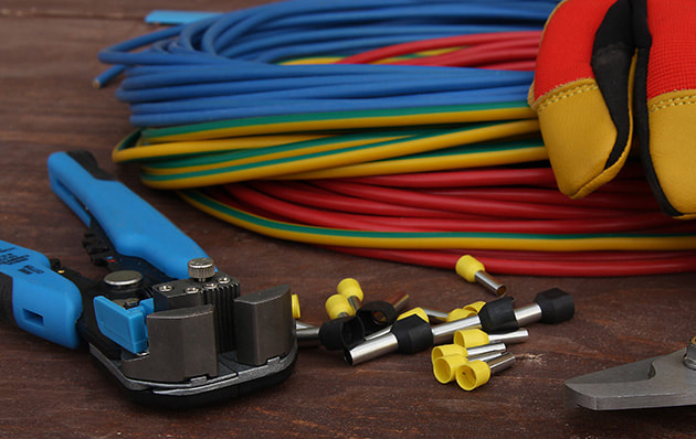 Electrical cables and tools on a table