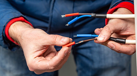 Electrician preparing wires for an installation