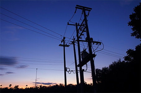 Sunset photo of an electricity pole